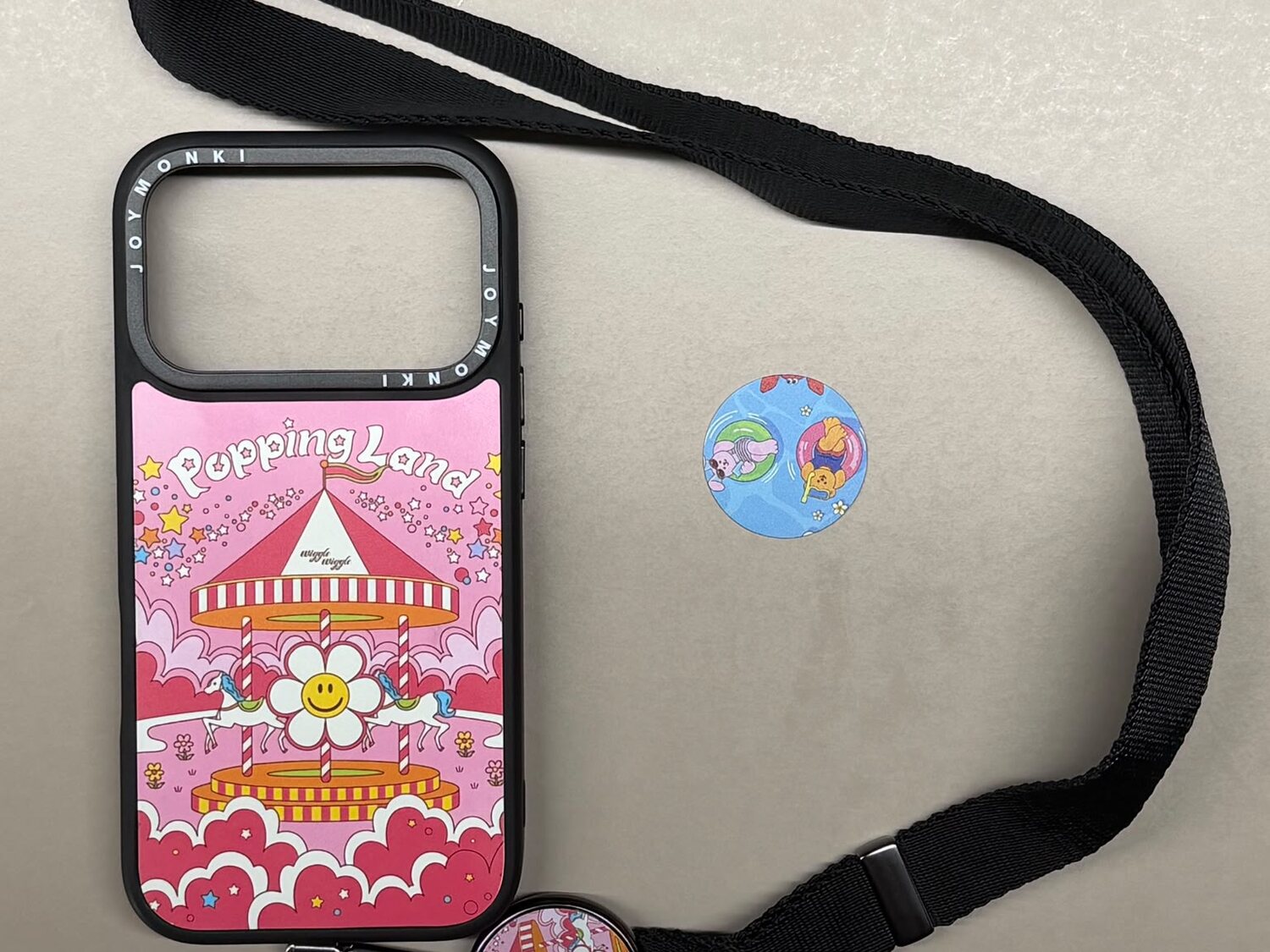 Printed phone accessories laid out on a table.